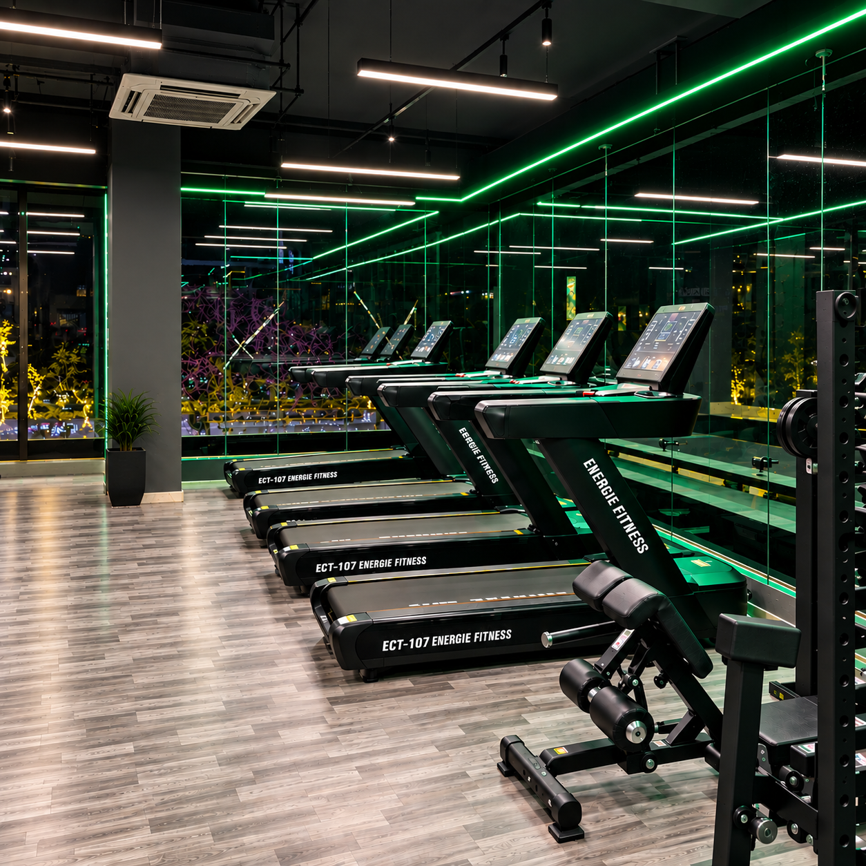 Row of treadmills in the cardio workout area at FIT NATION GYM in Nagasandra, Bengaluru
